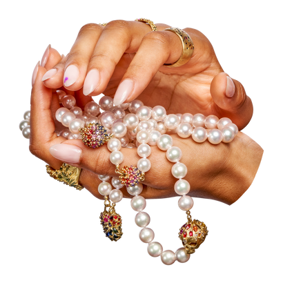 floating hand with pearls