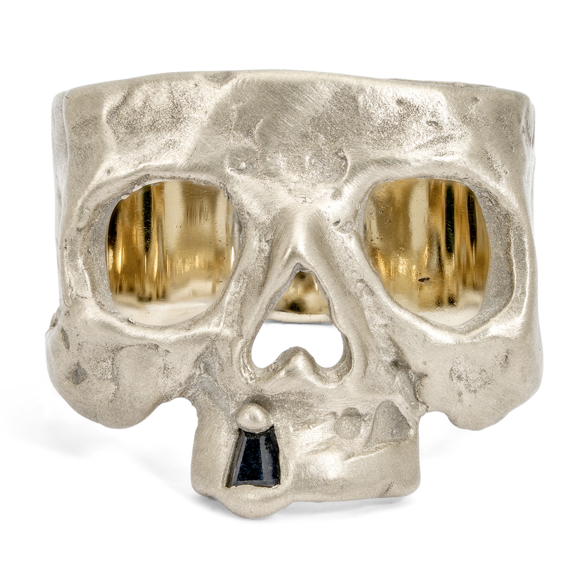Black Snaggletooth Skull Ring in White | Polly Wales